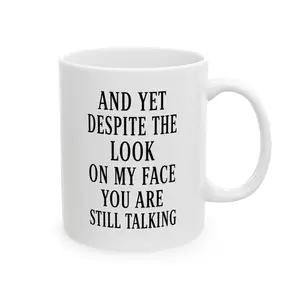 "And Yet Despite The Look On My Face You Are Still Talking", Funny Sarcastic Coffee Mug, Rude Office Gift, Coworker Bestie Tea Cup, Attitude Mug, Snarky Work Desk Gift, Relatable Quote Mug, White...