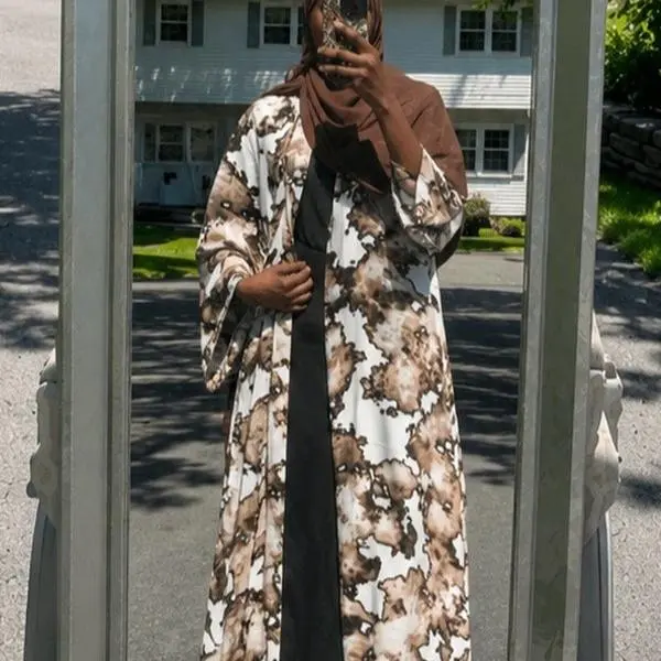 Elegant and modest printed chiffon abaya designed with a beautiful flowing silhouette and matching hijab. Available in multiple unique floral and patterned color combinations. Lightweight, flowy, and comfortable, making it perfect for everyday wear.