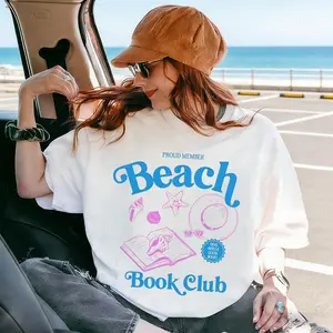 "Beach Book Club" Proud Member Oversized T-Shirt, Summer Coastal Bookworm Design, Cute Coastal Seashell and Book Design, Casual Everyday Wear, Comfortable and Soft Fabric, Perfect for College Students' Outings