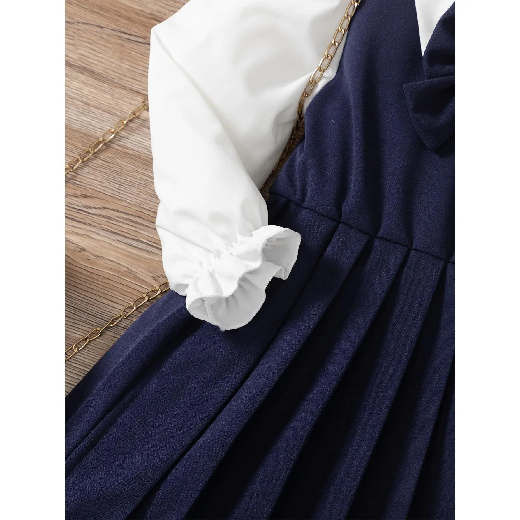 Chic Little Girls Pinafore Dress | Trendy Navy Blue Pleated Skirt & Bow  Accent Jumper Outfit