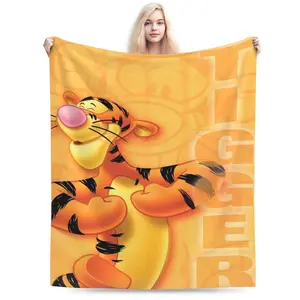 DISNEY CLASSIC Tigger Throw Blanket – Vibrant Tigger  Character Design, Orange Background with "TIGGER" Text, Soft Fleece Blanket for Kids, Bedroom or Gift