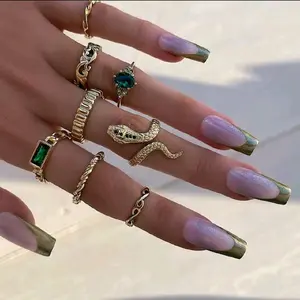 8 pcs style vintage faux gemstone snake twist rings for women retro ocean wave, available in golden color..
