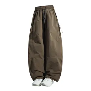 American retro solid color drawstring elastic waist pants with side zipper pockets and rear pocket, adjustable cuffs, ice silk fabric, loose long pants; men’s quick-dry breathable casual pants for everyday wear and outdoor sports; unisex design. summervib