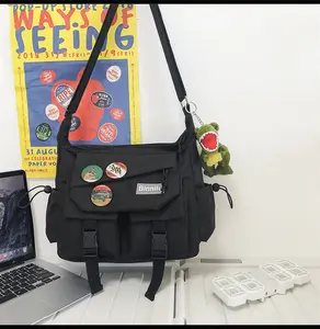 1pc Men's Casual Japanese Style Crossbody Backpack - Adjustable Shoulder Straps, Large Capacity with Multiple Pockets, Sports & Travel, Travel Backpack, Playful Decor Accents - Equipped with 3 badges