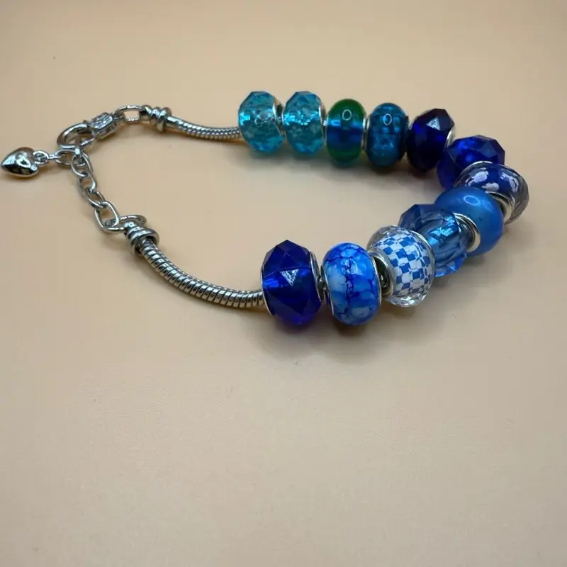 Blue Beaded Bracelet with Silver Chain and Charm - Fashionable and Stylish Accessory for Women