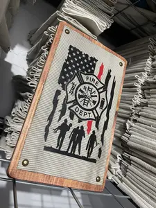 Fire Hose Thin Red Line Flag Sign with firefighter figures. The sign is made from used/decommissioned fire hose and the graphic is made with heat pressed vinyl. The sign is 100% made in the USA from a small shop called Crafty American