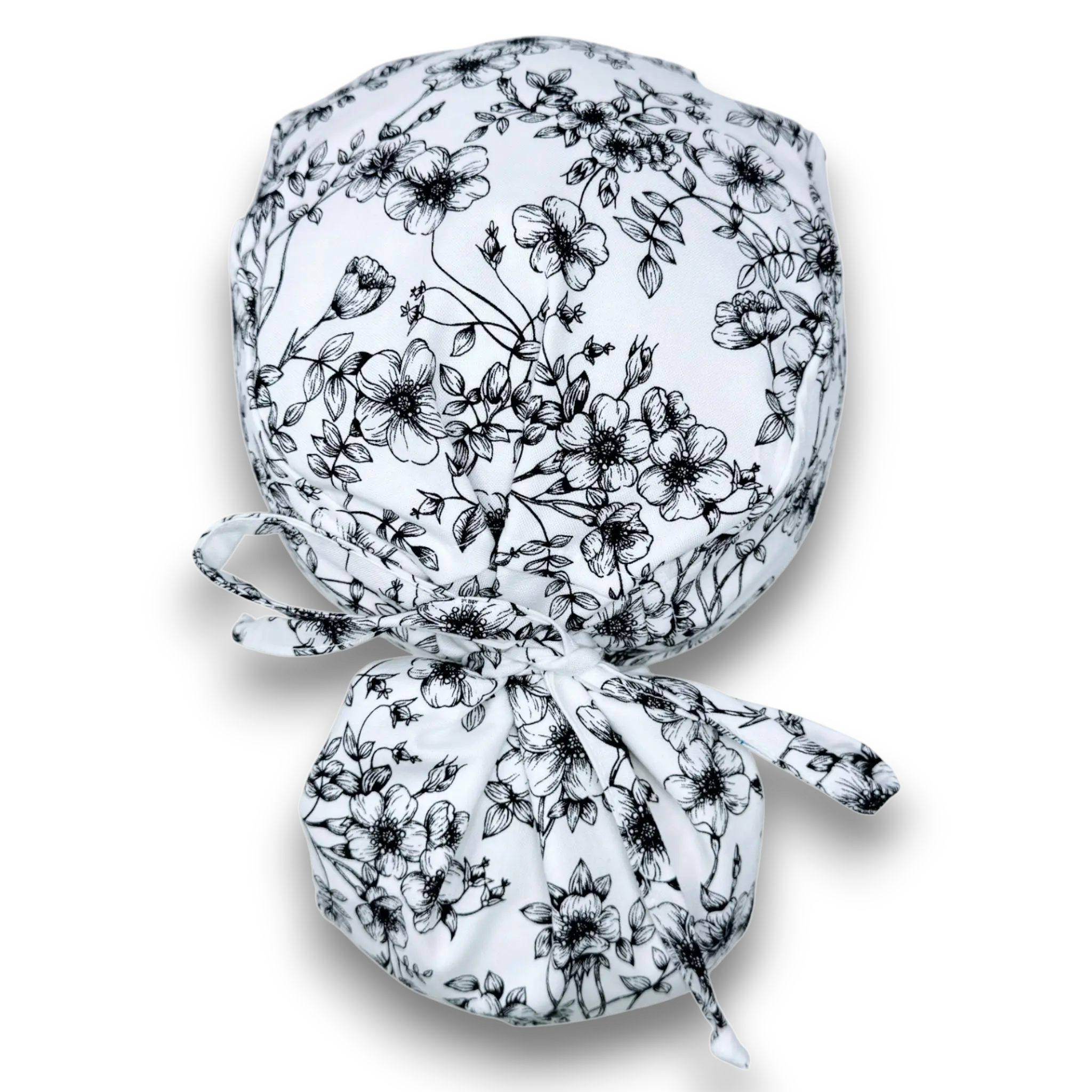 Floral Ponytail scrub cap for women with satin lined option by Paradise Caps.