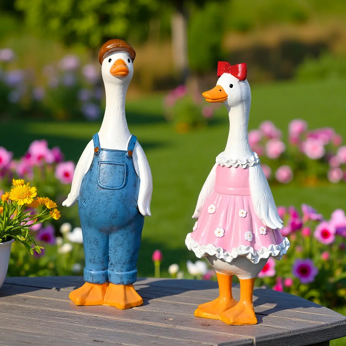 Hand-painted, weather-resistant resin garden duck statue — playful cowboy design, pink dress ornament, outdoor lawn and courtyard decoration, July gift decor, courtyard art, fun and whimsical