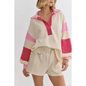 Women’s oversized color-block sweatshirt with a V-neck, long sleeves, casual loose pullover fit, striped contrast colors, fitted winter hoodie available in pink and white