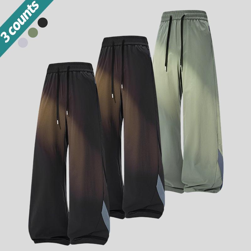 3-pack men’s loose casual pants with an adjustable elastic drawstring waist, suitable for the gym, training, and casual wear. Comfortable stretchy fabric, breathable material, loose fit—an essential for sports enthusiasts.
