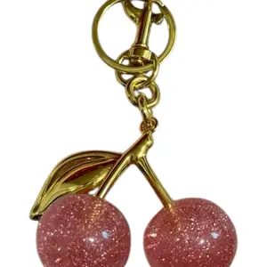 Pink cherry bag charm with gold hardware