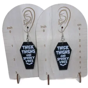 Thick thighs and spooky vibe earrings