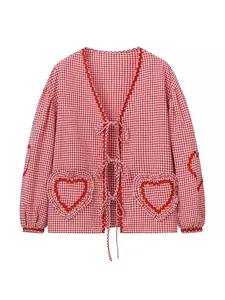 A women's long-sleeve plaid shirt with a V-neck, tie bow, heart-shaped pockets and lantern sleeves, suitable for both indoor and outdoor wear.