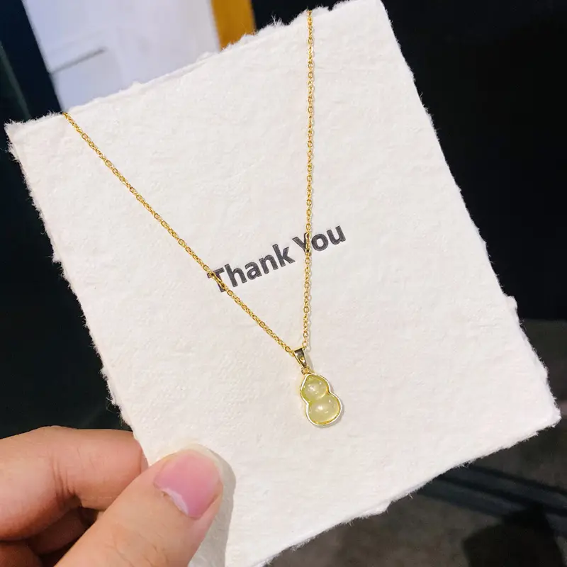 D08 Golden Cat's Eye Stone Gourd