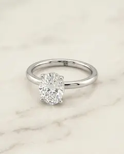 The Joni Hidden Halo Solitaire Engagement Ring Setting for Oval Diamonds in Platinum