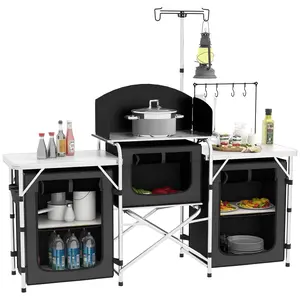 Aluminum outdoor camping kitchen table, perfect for backyard barbecues. It features powder-coated steel frame with stable X-shaped supports and storage cabinets fitted with roll-up mesh doors.