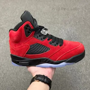 Gender neutral bright red matte suede high top sports shoes, delicate mesh side panel detail, durable scratch resistant ice blue crystal outsole, striking two-tone casual sneakers as holiday,