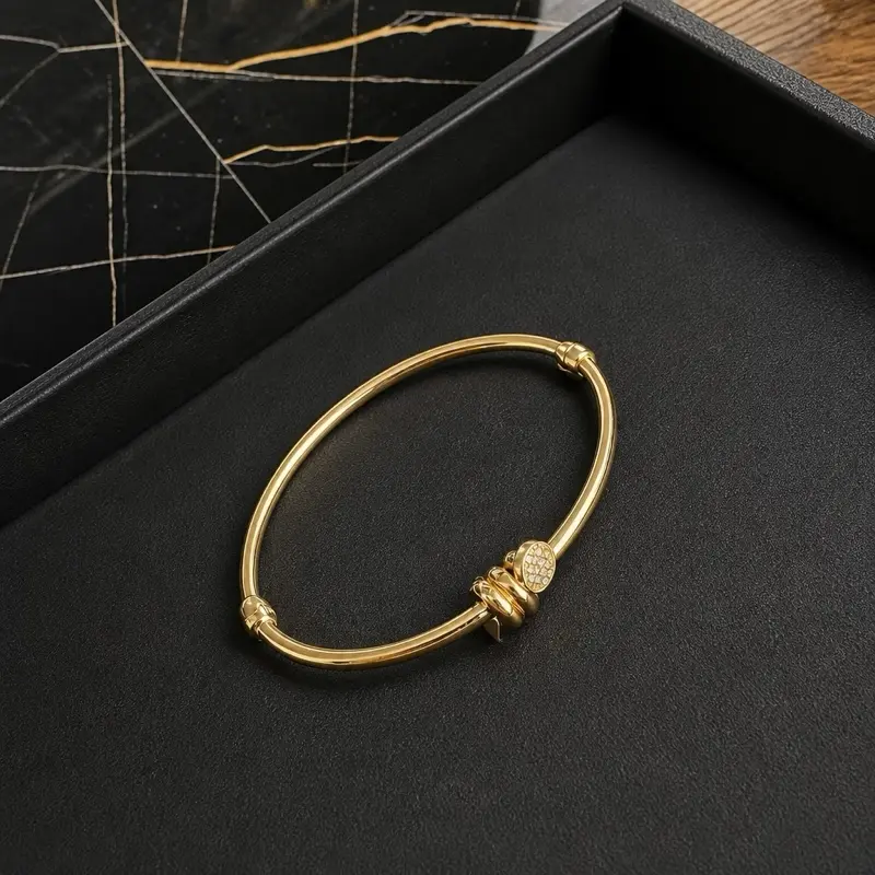 Elegant Gold Bangle Bracelet with Rhinestone Accent for Women's Fashion Accessory