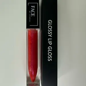 Diva Lip Gloss - Glossy Red Lipstick in Clear Packaging with Black Box - Makeup