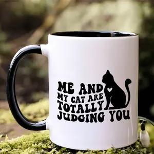 1 piece, 3A grade, ME AND MY CAT ARE TOTALLY JUDGING YOU, funny humorous morning coffee mug with cute cat, 11 oz ceramic decorative tea cup ideal birthday gift perfect for office/ house living/ party/ anniversary for friend, cat lovers