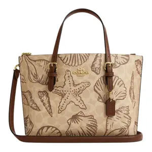 COACH Mollie Signature Canvas Tote Bag with Shell Print for Women in Sand Color
