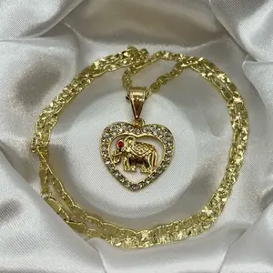 clear rhinestone gold plated heart pendant with red eyed elephant necklace