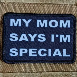 my mom says i'm special funny 2"x3" morale patch with hook and loop backing green background
