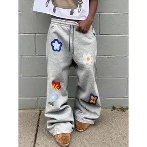 Floral print sports pants, casual athletic pants, streetwear style, comfortable fabric, unisex fashion, spring and autumn wear, TikTok fashion design GARMENTARY