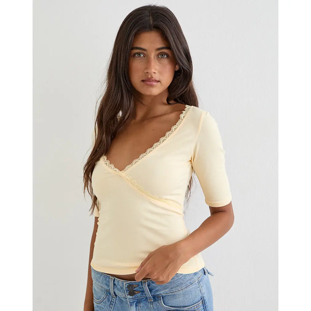 Motelrocks Sajiwa Women's Solid Bodycon Top, Buttermilk Wrap Blouse with a Deep V Neck and Lace Trim, Available in Extra Small