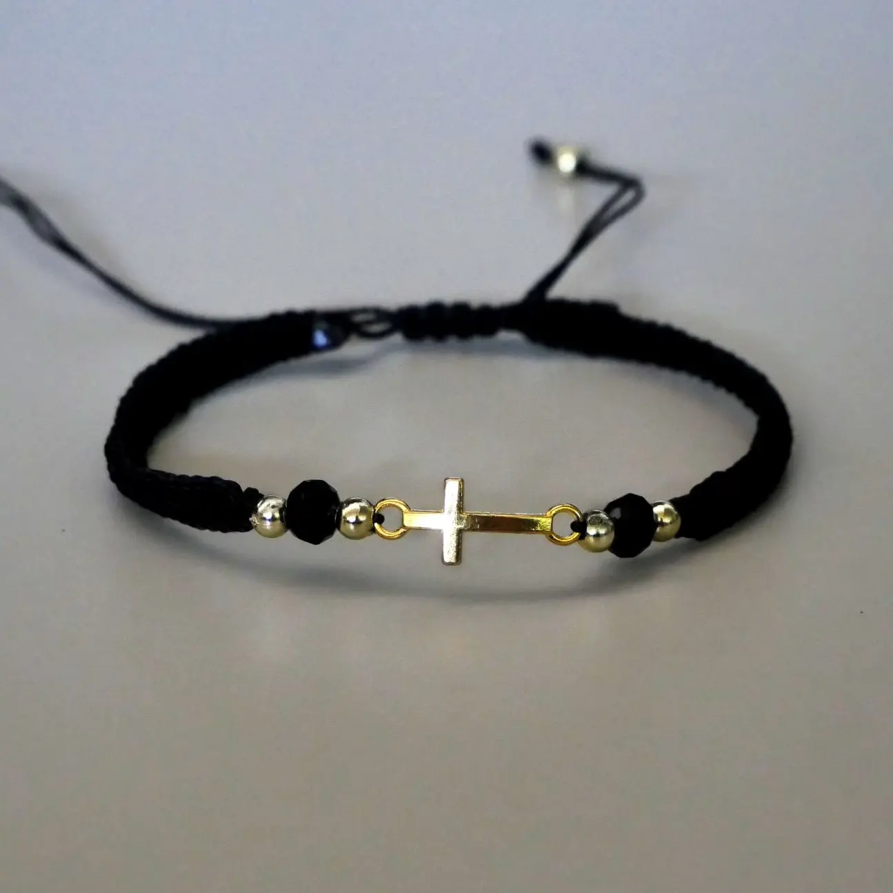 SM Charm Golden Cross Braided Black Bracelet with Black Beads