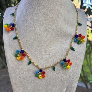 Collares $20 - Mexican Handmade Glass Beaded Necklace for All Seasons with Colorful Flower Beads and Gold Chain