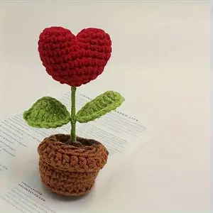 A handcrafted heart-shaped crochet peony potted plant that never fades, with faux wool flowers, Flower Arrangement, is a light luxury gift for the Qixi Festival, Valentine's Day and Mother's Day