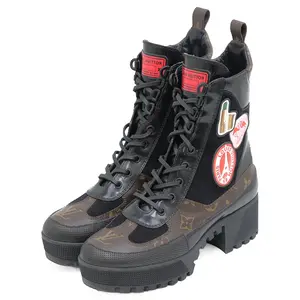 Pre-owned Louis Vuitton Patent Leather Small Leather Goods Laureate Monogram Boots