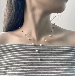 NC074-The ‘Dewdrop’ Lariat — An Ethereal Floating Freshwater Pearl Y-Necklace. floating pearl necklace, illusion pearl necklace, pearl y necklace, pearl lariat, freshwater pearls, dainty pearl necklace, quiet luxury, old money aesthetic