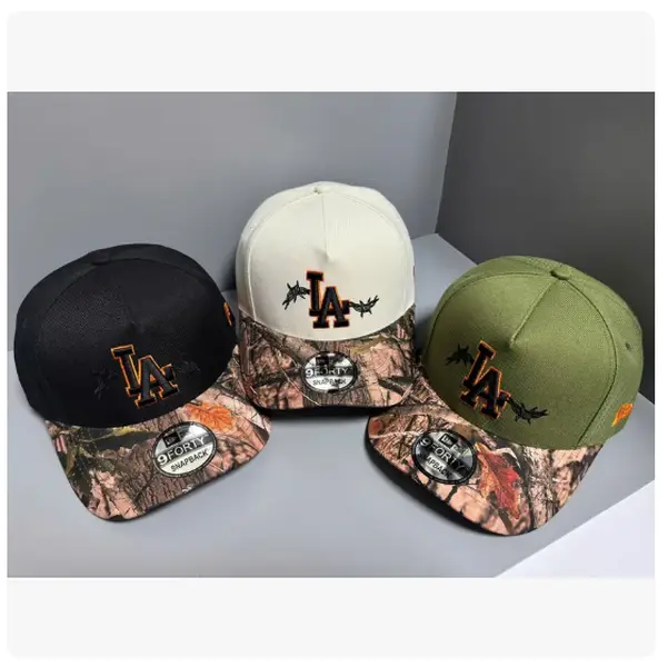 New Era LA Black Hunting Camo Snapback Hat, Premium 9FORTY Adjustable Unisex Cap, Orange Embroidered Logo, Retro Streetwear, Fall Outdoor Fashion, Halloween Holiday Gift, Trucker Hat, USA 2026 Urban Fashion Trend, TikTok Viral Sports Collectible Headwear