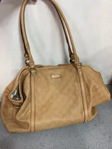 Pre-owned GUCCI leather Shoulder Bags GG embossed shoulder bag, beige with dual top handles and side pocket detail.xb0051#