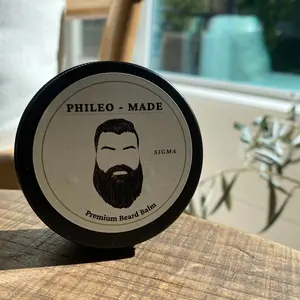 PHILEOMADE PREMIUM BEARD BALM WITH ORGANIC MANGO BUTTER - ALPHA: Fresh notes of bergamot and lemon with warm vanilla undertone. You’ll want to take this everywhere you go!