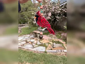 Adorable Hanging cardinal , Handmade  ornament / wind chime, stoneware clay. Acorn bell