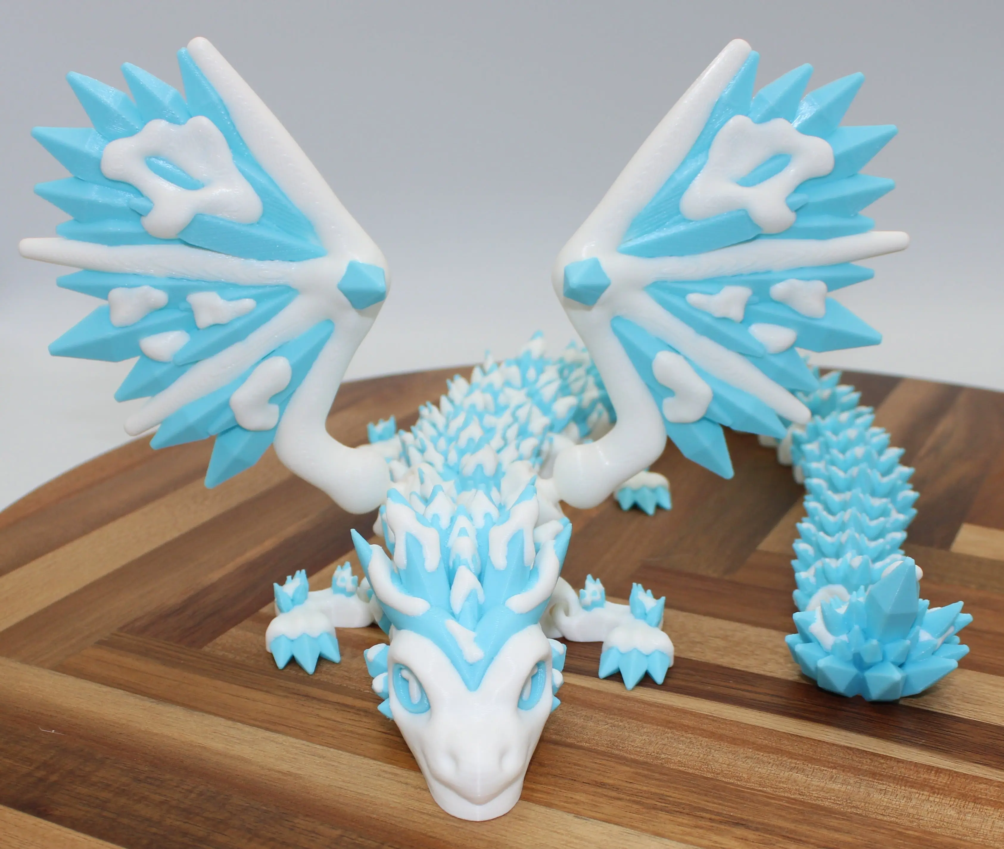 Frostwake Leviathan of the Frozen Tides Premium Articulated Dragon Figure with Frozen Sea Aesthetic and Dual-Color Impact for Display