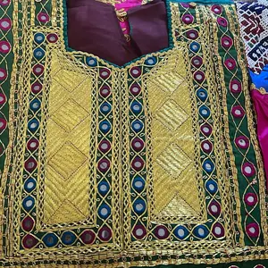 Afghani dress made by hand the quality is best and it look wonderful and in this dress the used beautiful colors on it and the shopping is free