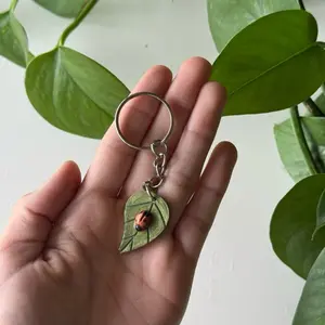 Junebug on a Leaf Handmade Keychain - Unique Design with Ladybug on Green Leaf Charm