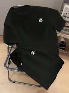 HK Logo Graphic Short Sleeve T-Shirt and Shorts Set | Y2K Streetwear Two-Piece Outfit for Men Women | Casual Loose Fit Summer Co-ord Set with Elastic Waist