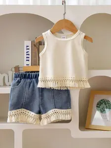 Boho Style Girls' Vacation Set, Vintage Fringe Sleeveless Vest + Irregular Hem Denim Shorts, Casual Fashion Ensemble
