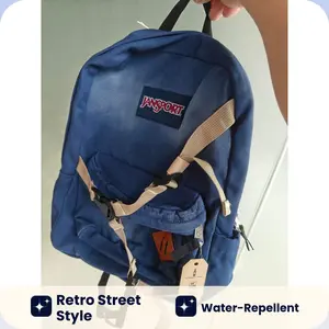 JanSport Vintage Washed Canvas Backpack, Classic School Daypack with Chest Strap for College & Daily Travel