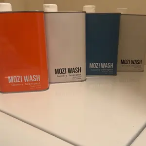 Mozi Wash Laundry Detergent 1 Pack  - World's Best Smelling - Plant Based Household Scented Cleaning Display Worthy Eco Friendly Tins Non Toxic Formula Cozy Cashmere Sugar Dew Desert Poppy Alpine Woods Central Coast  Vanilla Moon Infinitely Recyclable