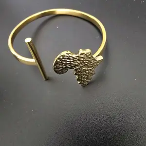 Gold African Statement Cuff Set – Brass Africa Map, Cowrie Shell & Hammered Cutout Bangles