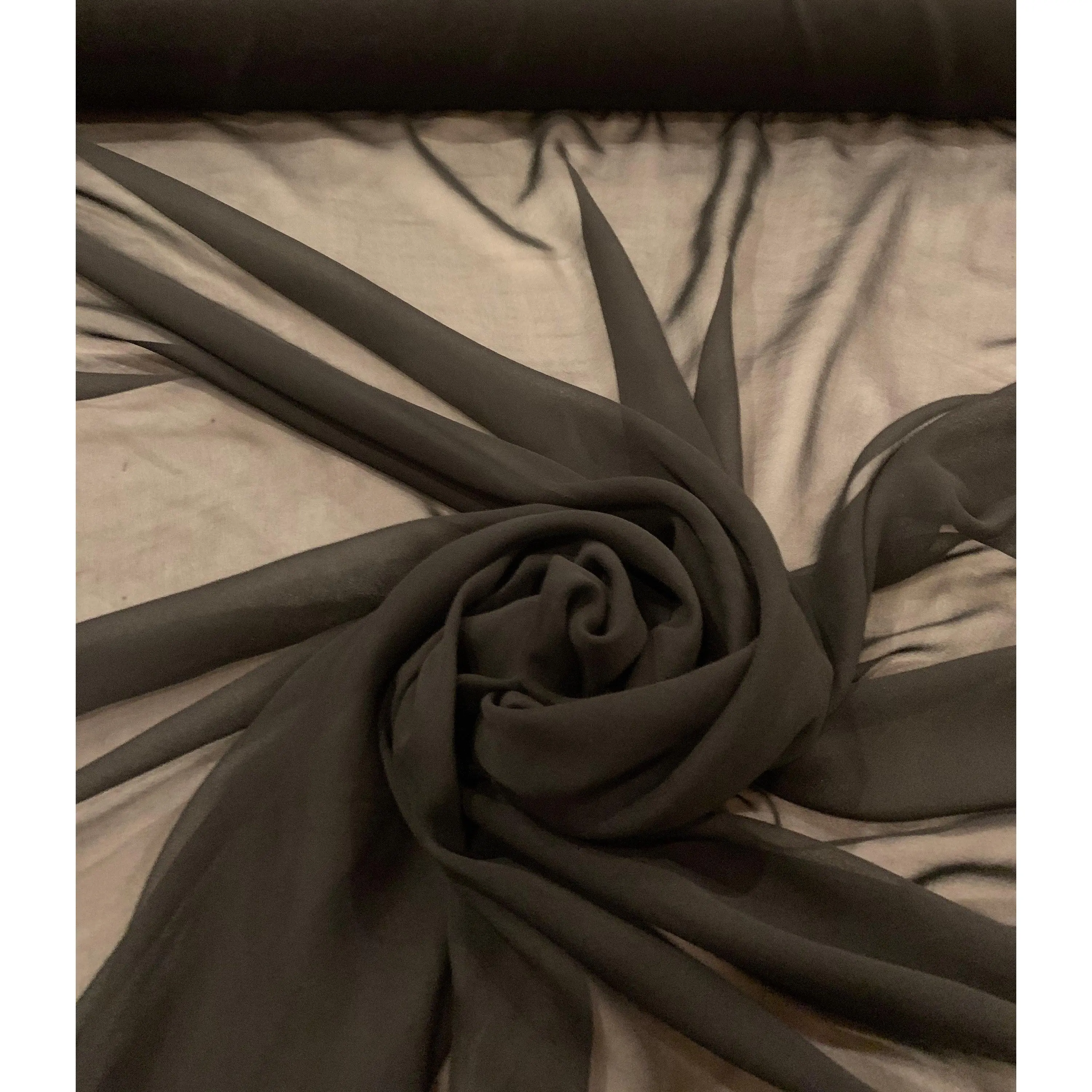 French silk chiffon fabric, 44” wide, sold by the yard. Colors available ivory and black