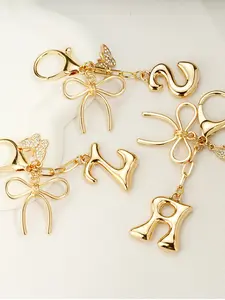 Personalized Initial Letter Bag Charm, Gold Bow & Butterfly Keychain, Custom Monogram Handbag Pendant, Perfect Birthday Christmas Valentine's Day Gift for Women Girls, Trendy Purse Accessory