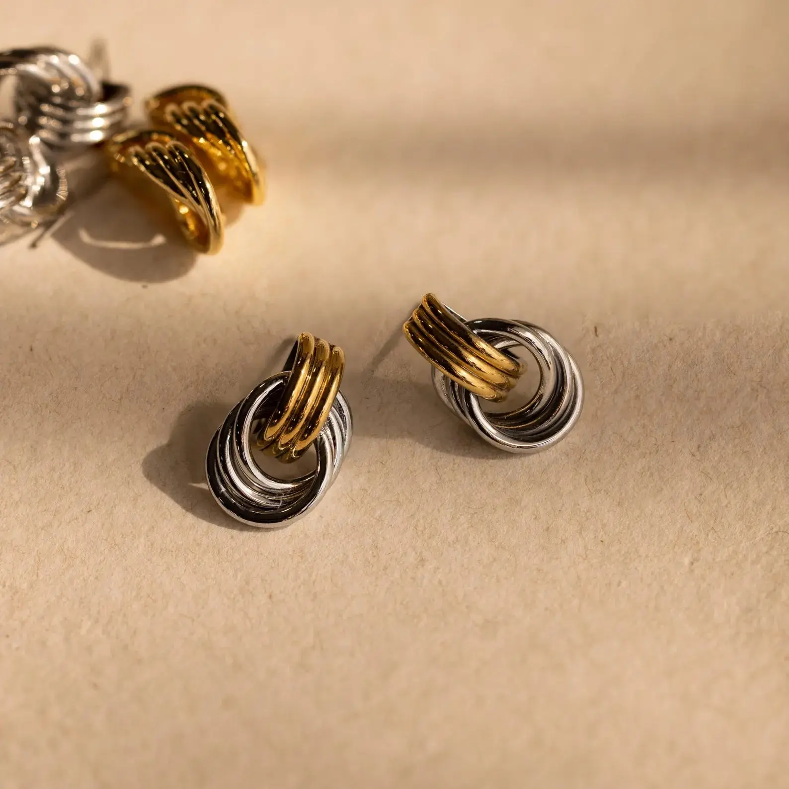 Mixed Metal Mini Triple Knot Earrings by Caitlyn Minimalist - Dangling Knot Stud Earrings - Statement Jewelry - Mixed Metal Jewelry - Sister Gift