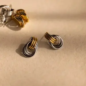 Mixed Metal Mini Triple Knot Earrings by Caitlyn Minimalist - Dangling Knot Stud Earrings - Statement Jewelry - Mixed Metal Jewelry - Sister Gift